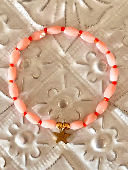 Charleston - bracelet rose orangé et breloque étoile Arastuce