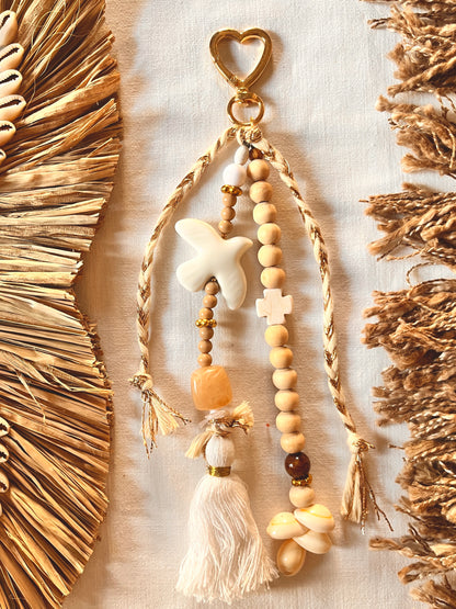 Paloméa– Grigri Colombe et perles coquillage Arastuce