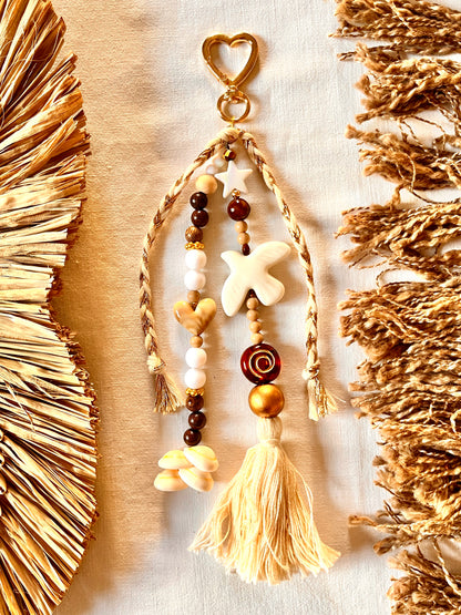Paloméa– Grigri Colombe et perles coquillage Arastuce