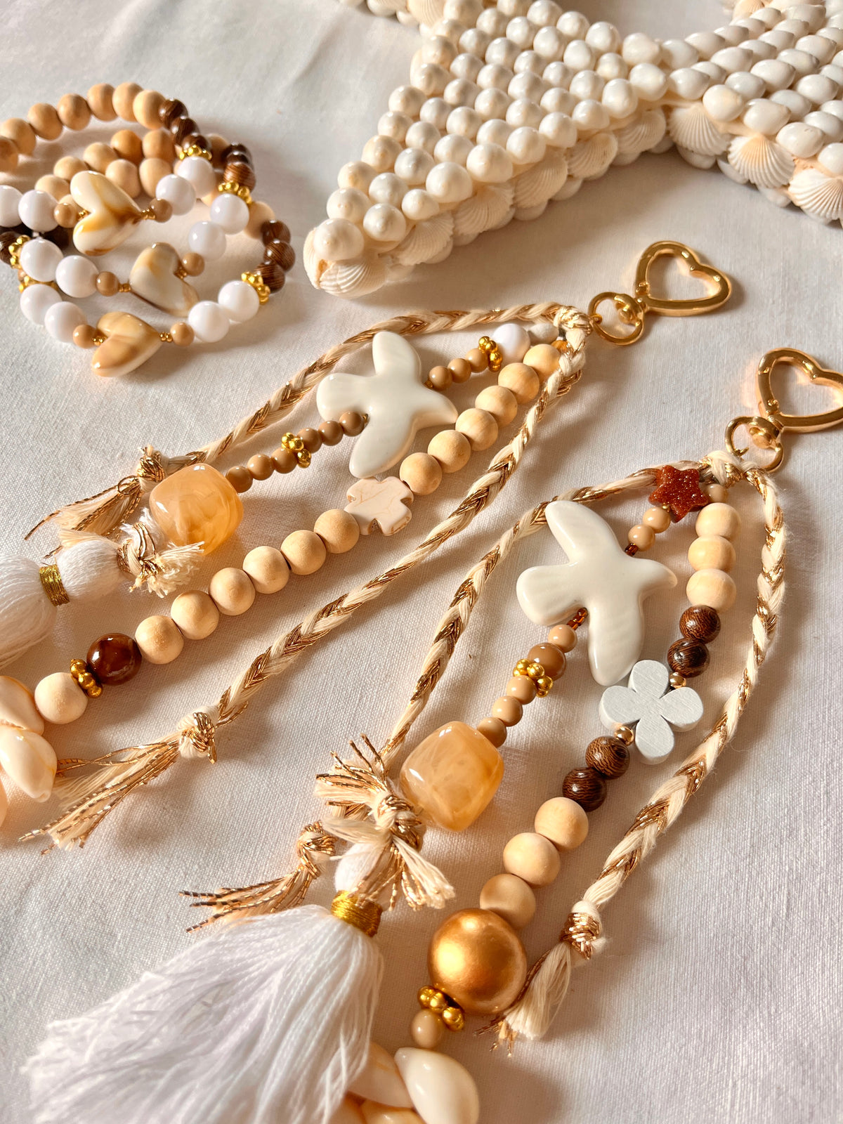 Paloméa– Grigri Colombe et perles coquillage Arastuce